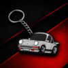 llavero deportivo clasico inspirado en un coche retro sobre fondo negro y rojo